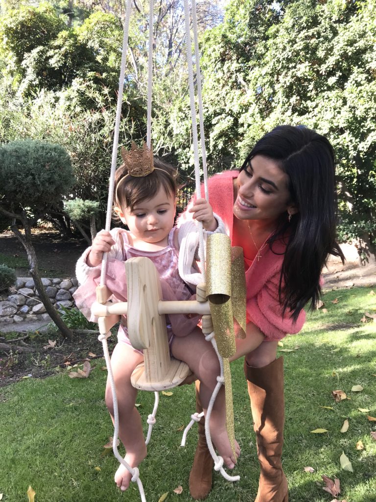 Valentina Loved her Wooden Horse Swing!