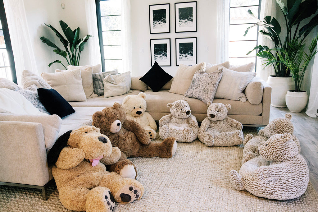 We filled our family room with these huge stuffed animals and bears so the babies could have a little space to have playtime with each other! Alessandra and her baby friends had the best time rolling around in here with each other!