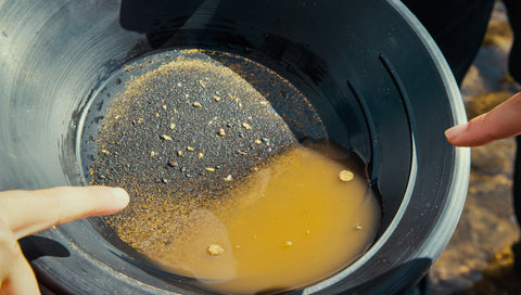 Gold inside a gold pan