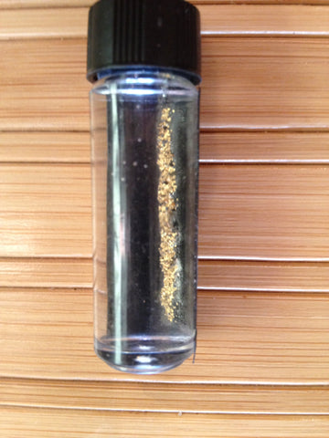 Flour gold in a vial