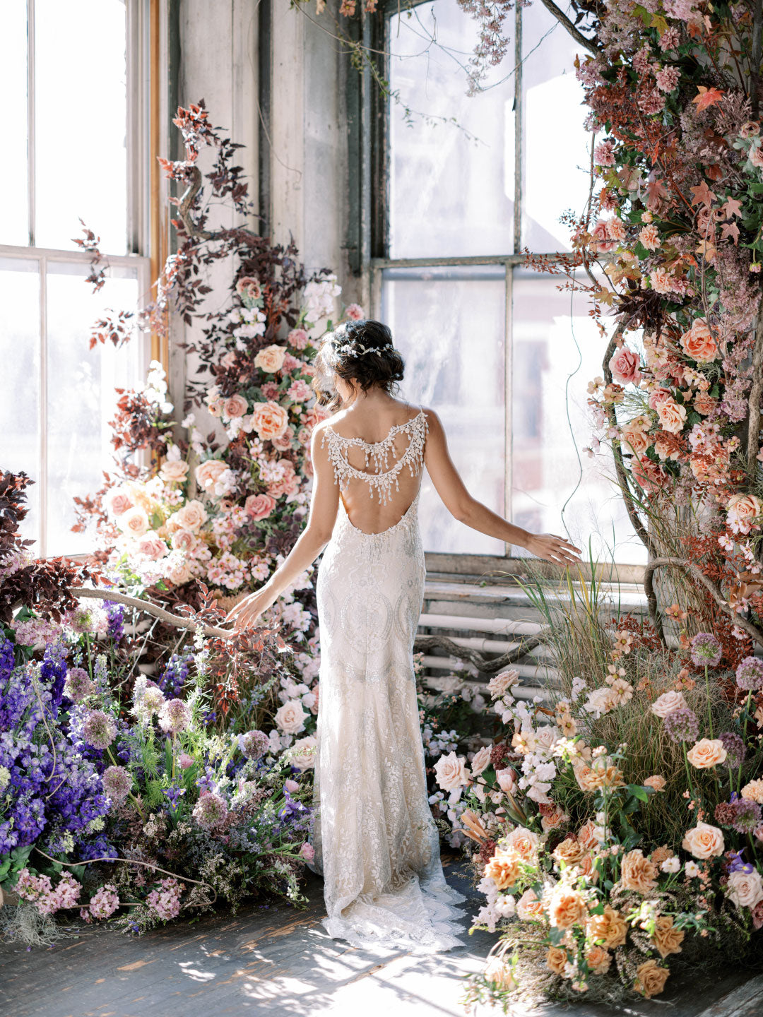 Wedding Dress Designer Claire Pettibone in mask designing Riviere Wedding Dress