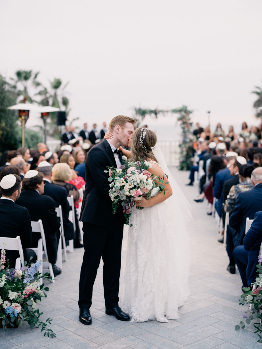 Bride and groom kiss after ceremony