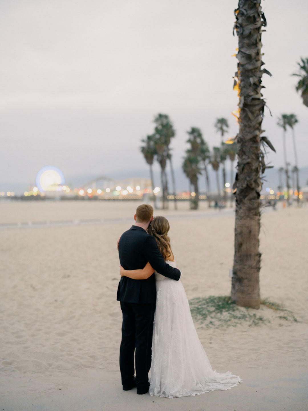Bride and Groom at beach for after ceremony