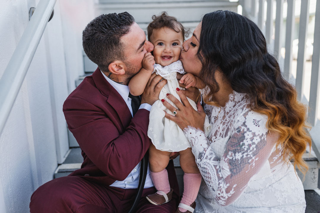 Bride with husband and baby