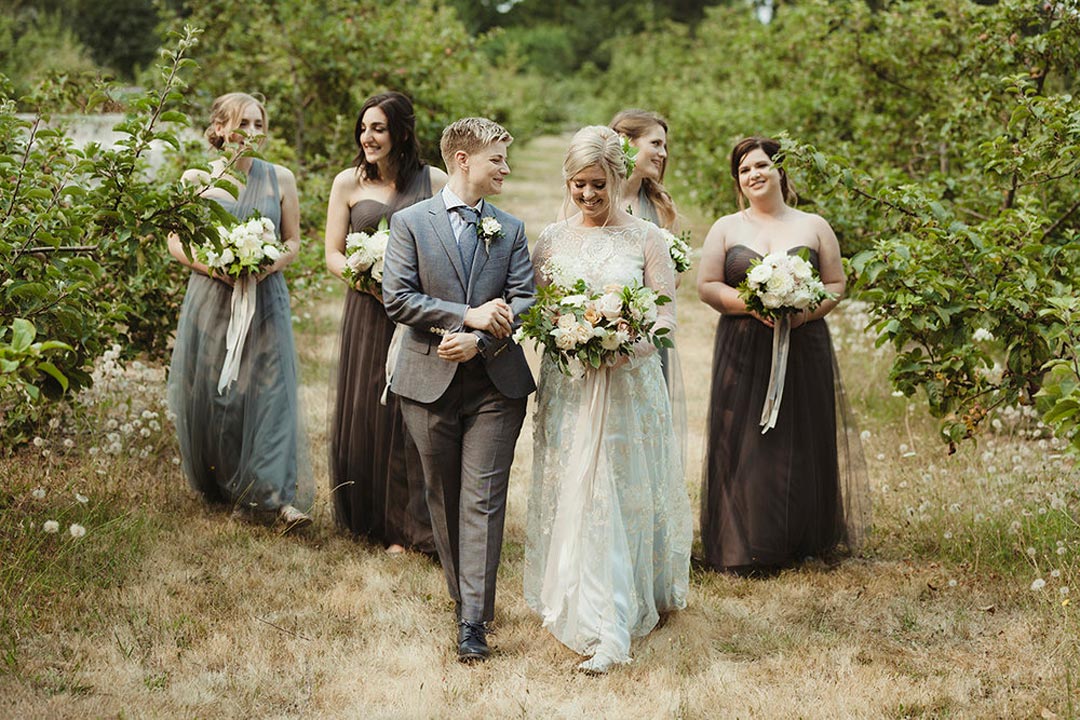 Bride and Partner walking for wedding portrait