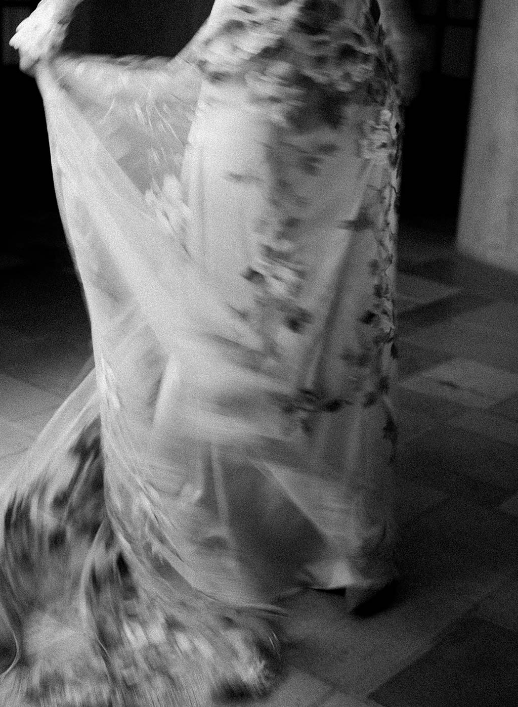 Black and white image bride in Flora Wedding Dress by Claire Pettibone