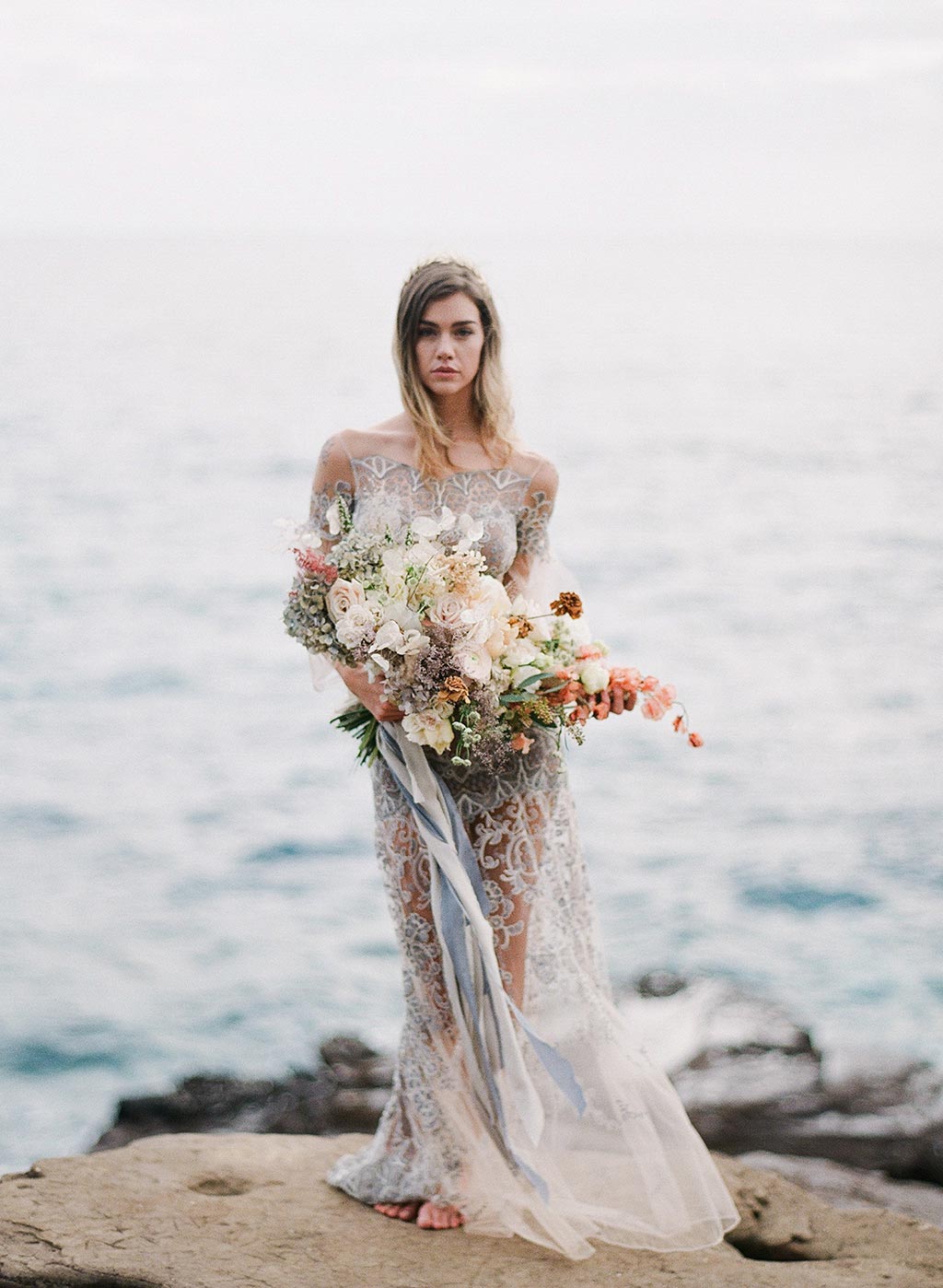 Wedding dress model with Ocean background