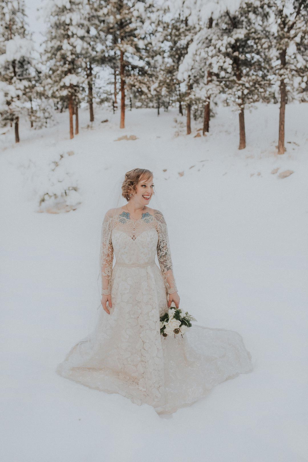 Bride in photo wear Vagabond Couture wedding dress designed by Claire Pettibone