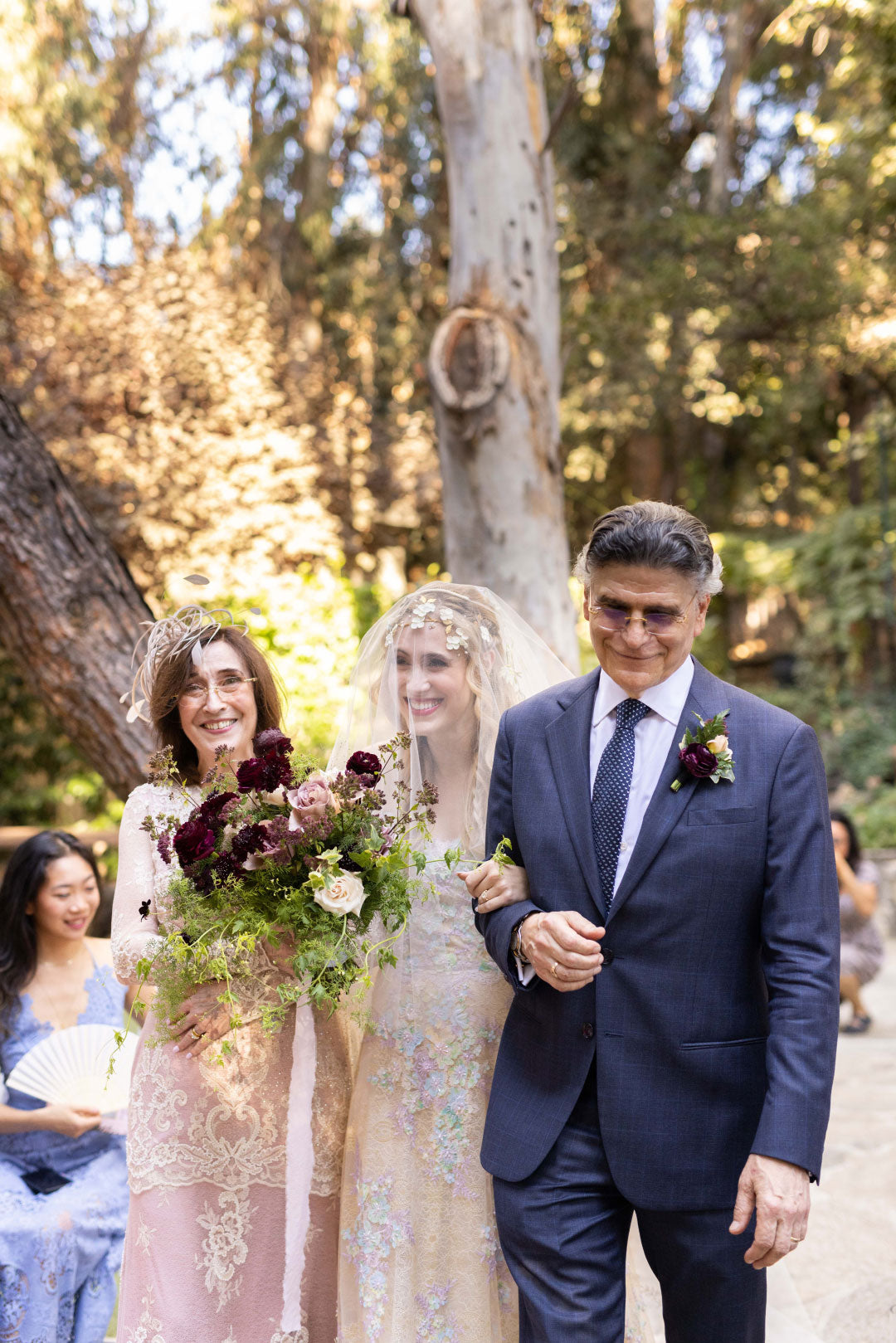 Bride walked by Mother and Father to Ceremony