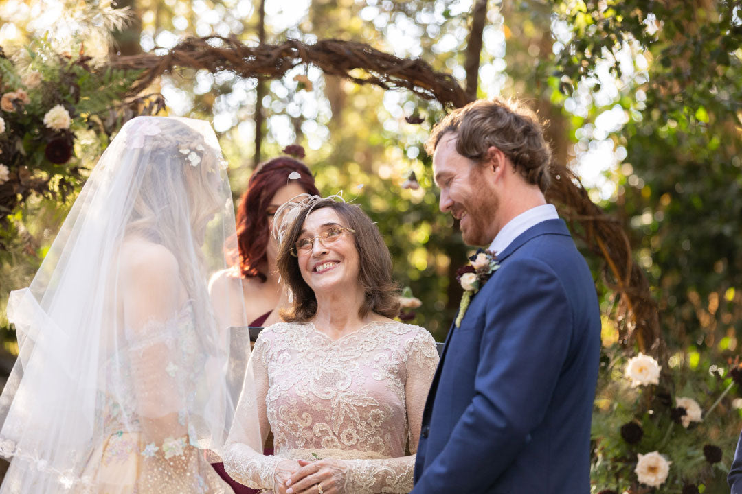 Bride with Groom and Mother of Bride wearing Claire Pettibone Dress Pearle