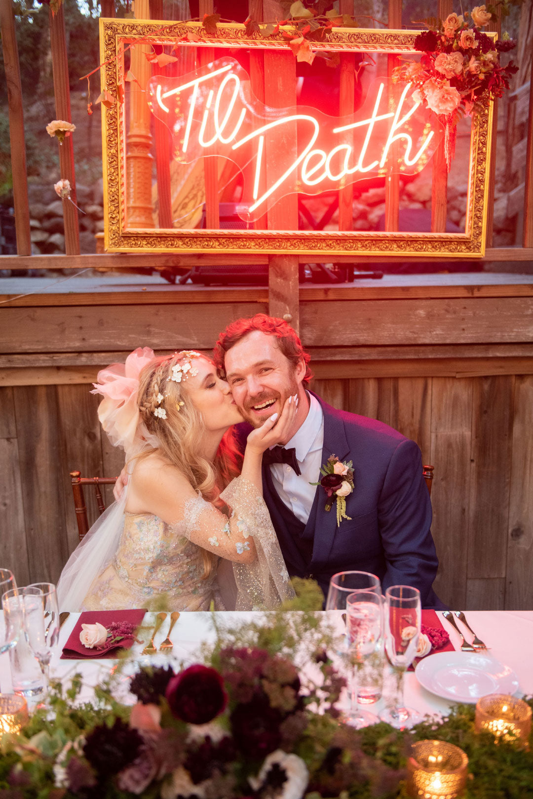 Bride and Groom seated at wedding dinner table