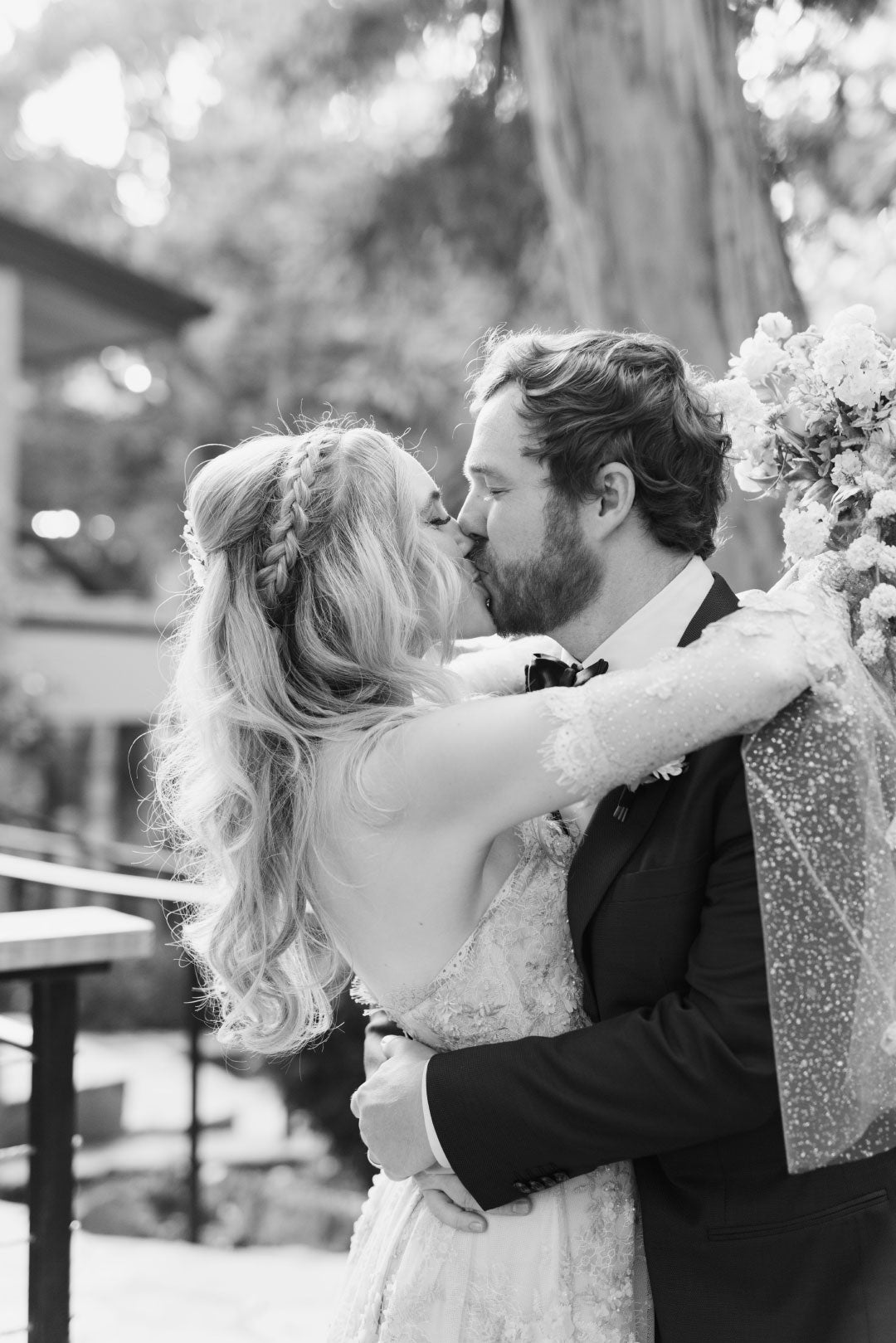 Bride and Groom Kissing Black and White Wedding Portrait