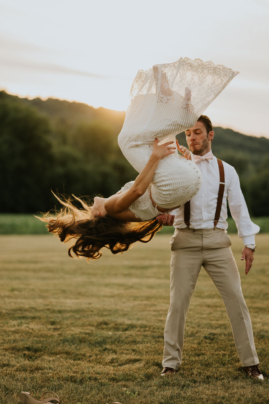 Bride Flipping in wedding dress