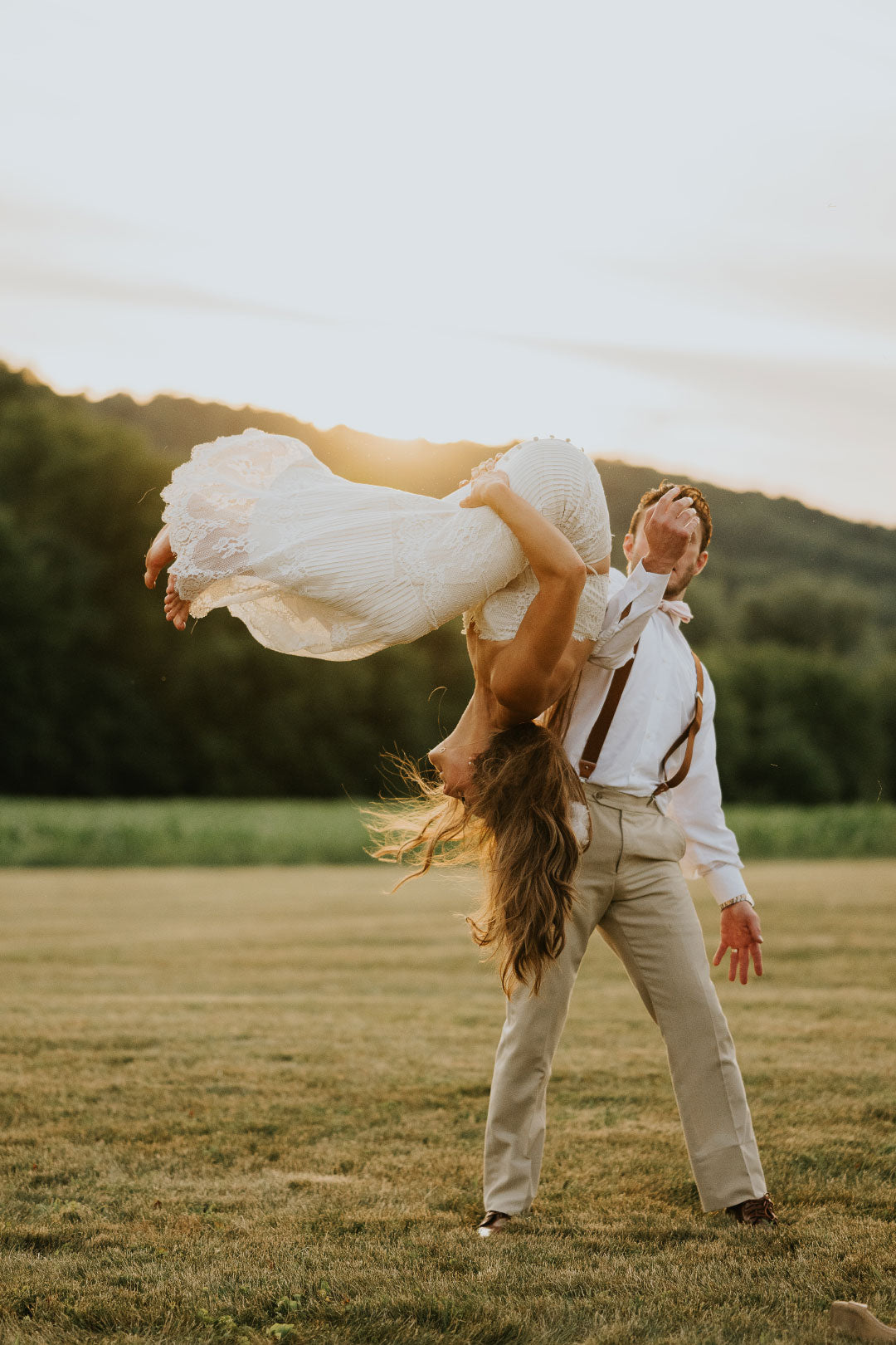 Bride Flipping in wedding dress