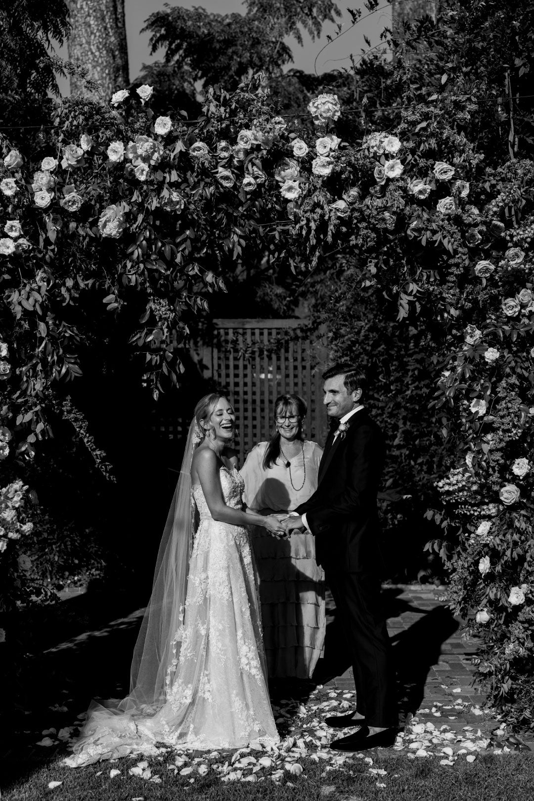 Bride and Groom laughing during ceremony