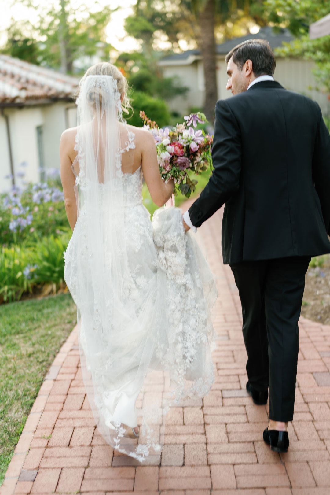 Bride and groom walking after the ceremony