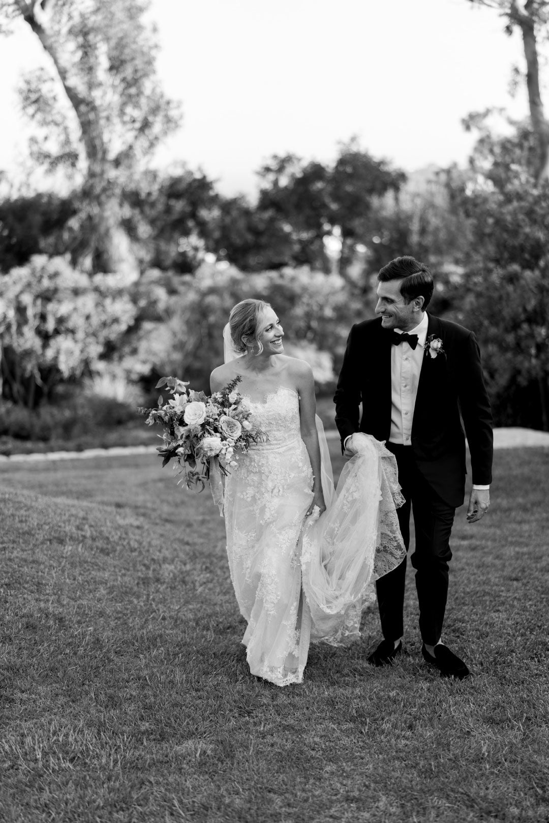 Bride and Groom walking together for wedding portrait