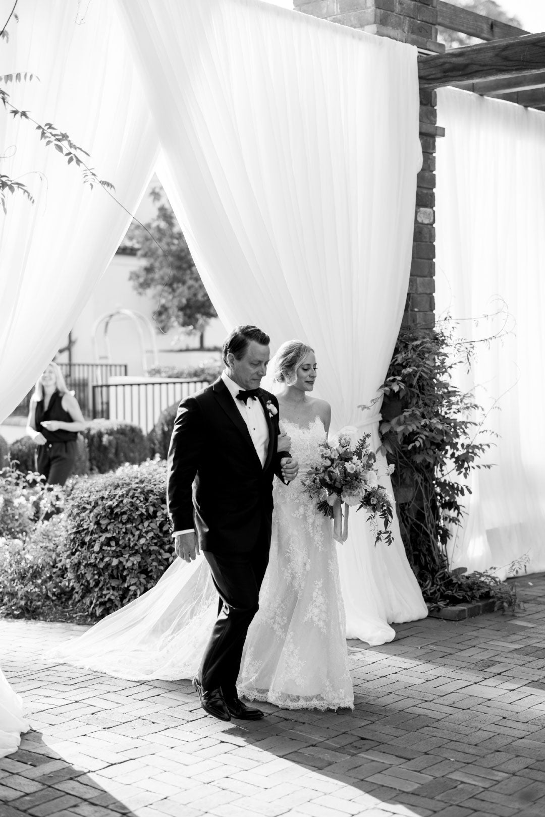 Father and Bride walking  the wedding aisle