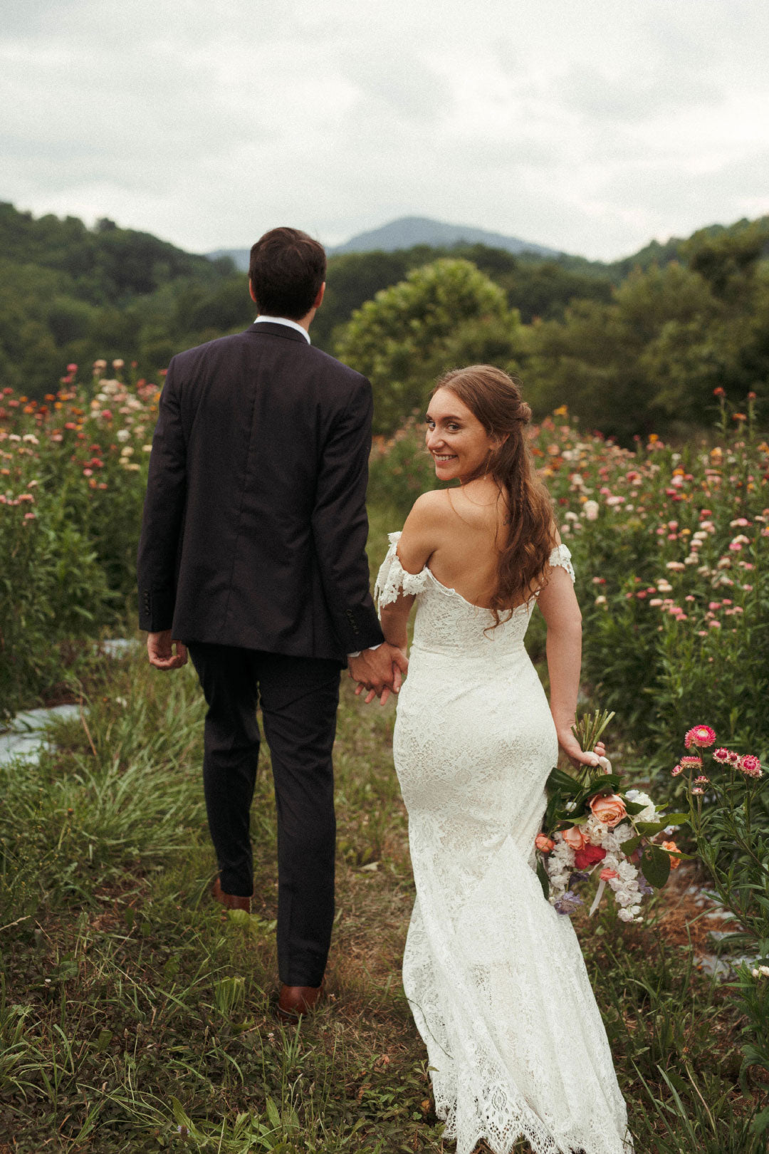 Bride and Groom walking after ceremony