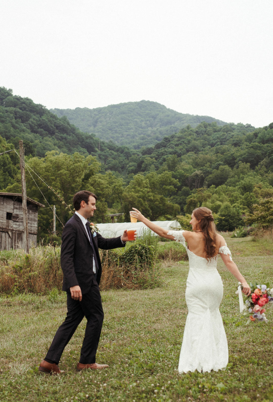 Bride and Groom toast each other