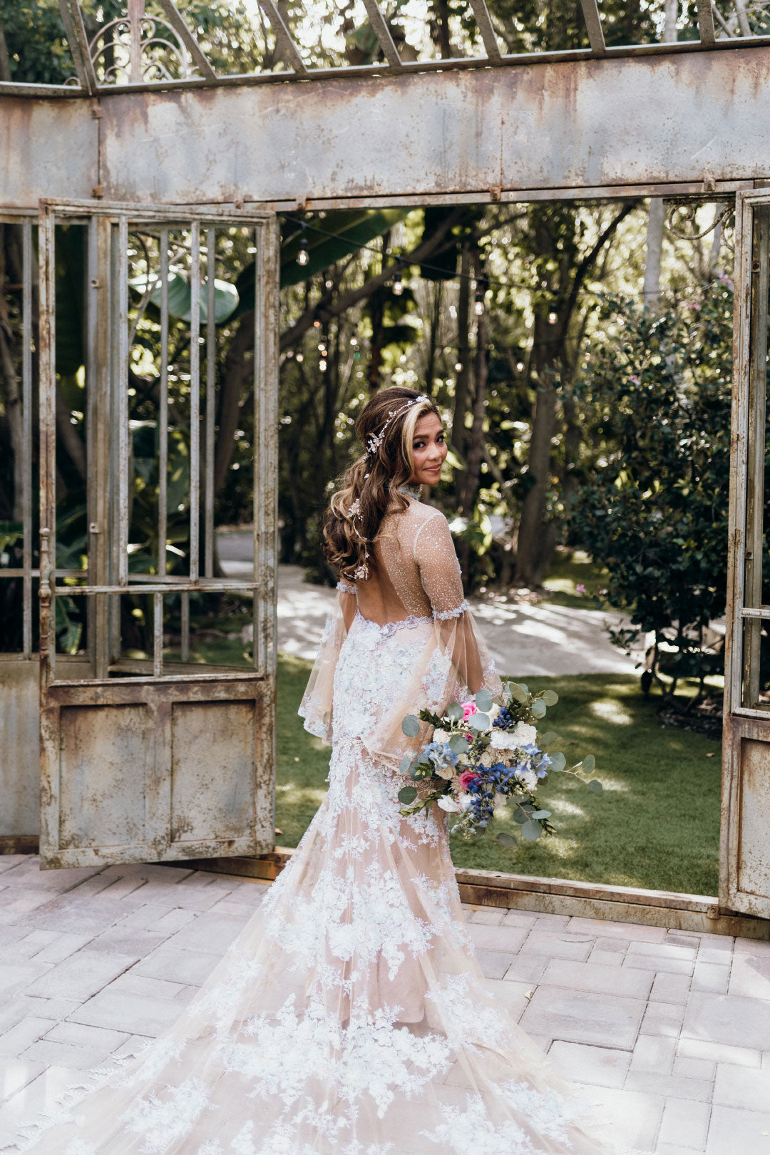 Bride in Venus Embroidered Wedding Dress by Claire Pettibone