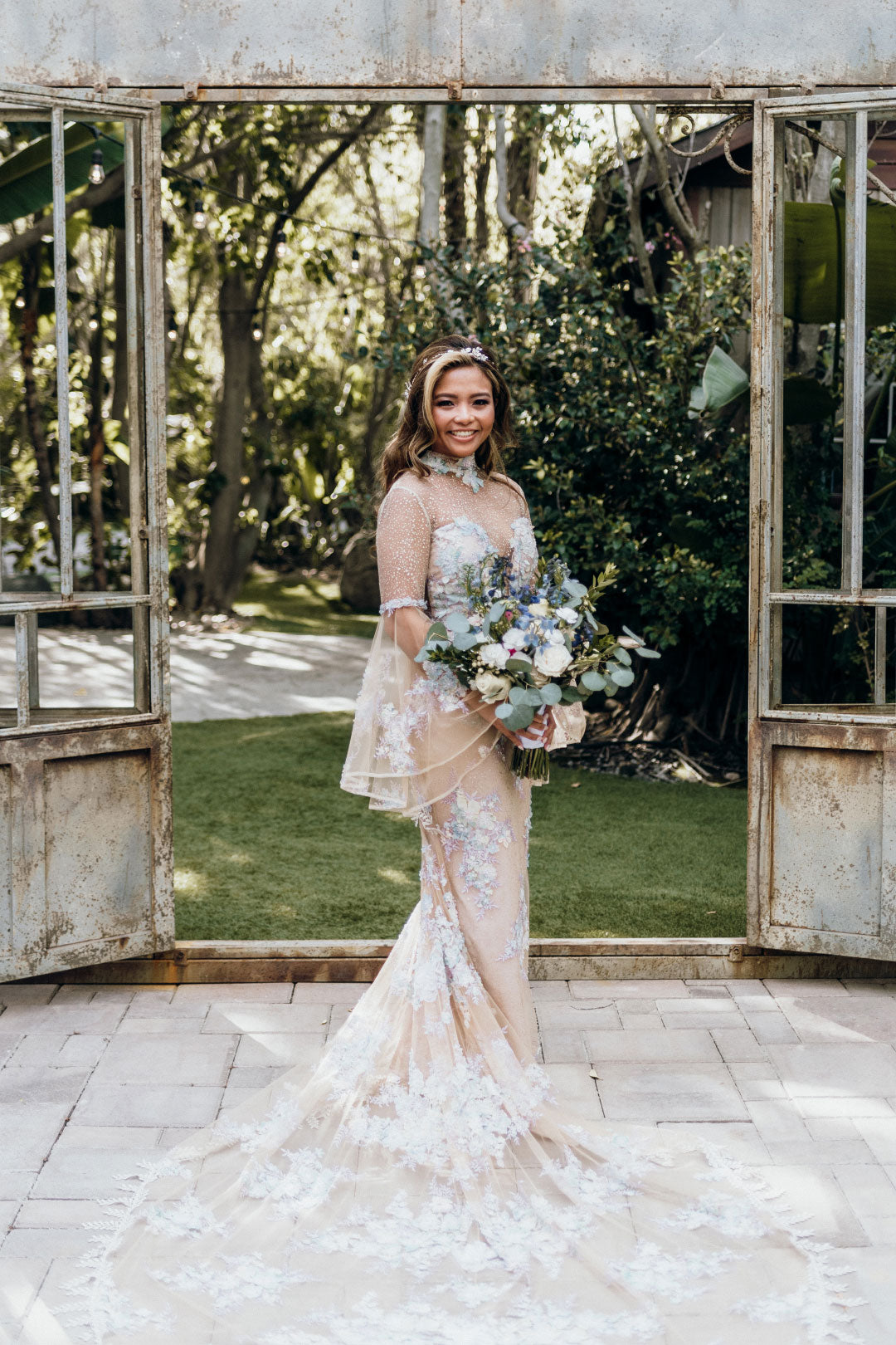 Bride in Venus Embroidered Wedding Dress by Claire Pettibone