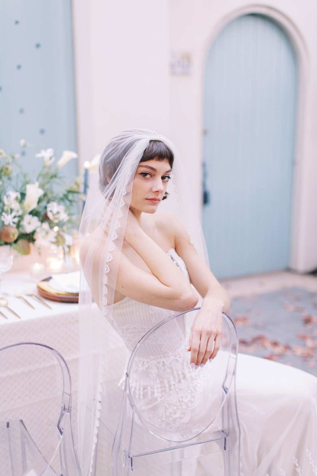 Bride seated at wedding table