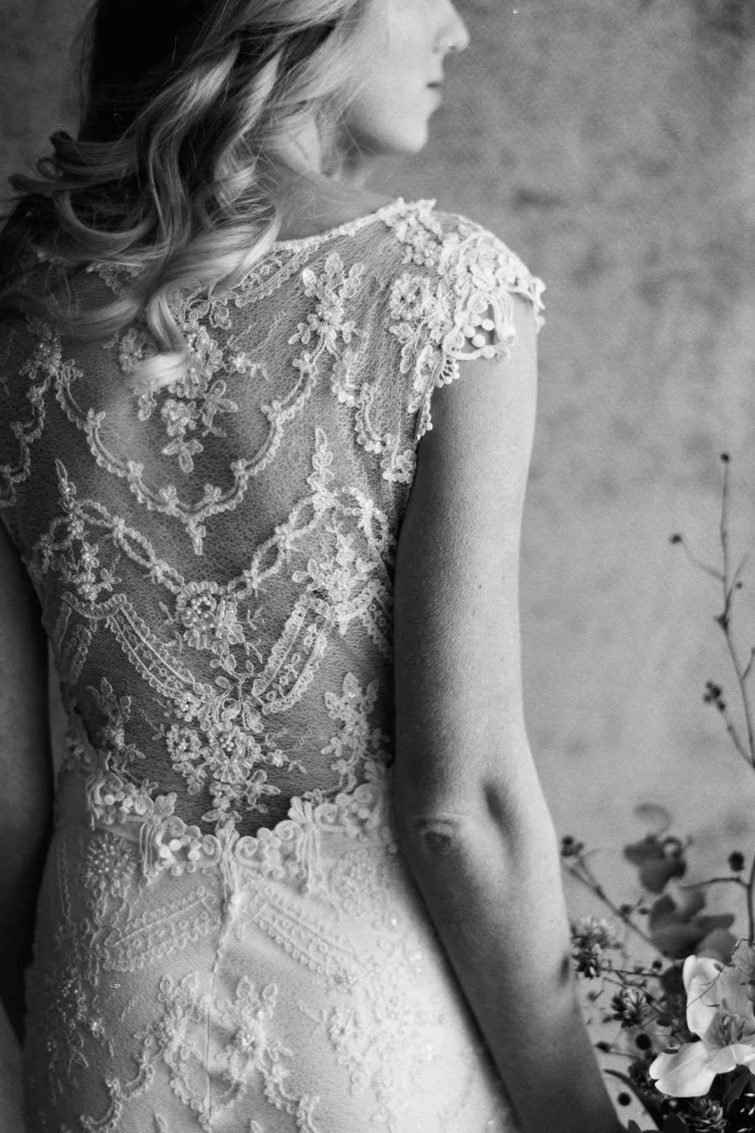 Bride in Chantilly Beaded Embroideredy Cap Sleeve Wedding Dress by Claire Pettibone