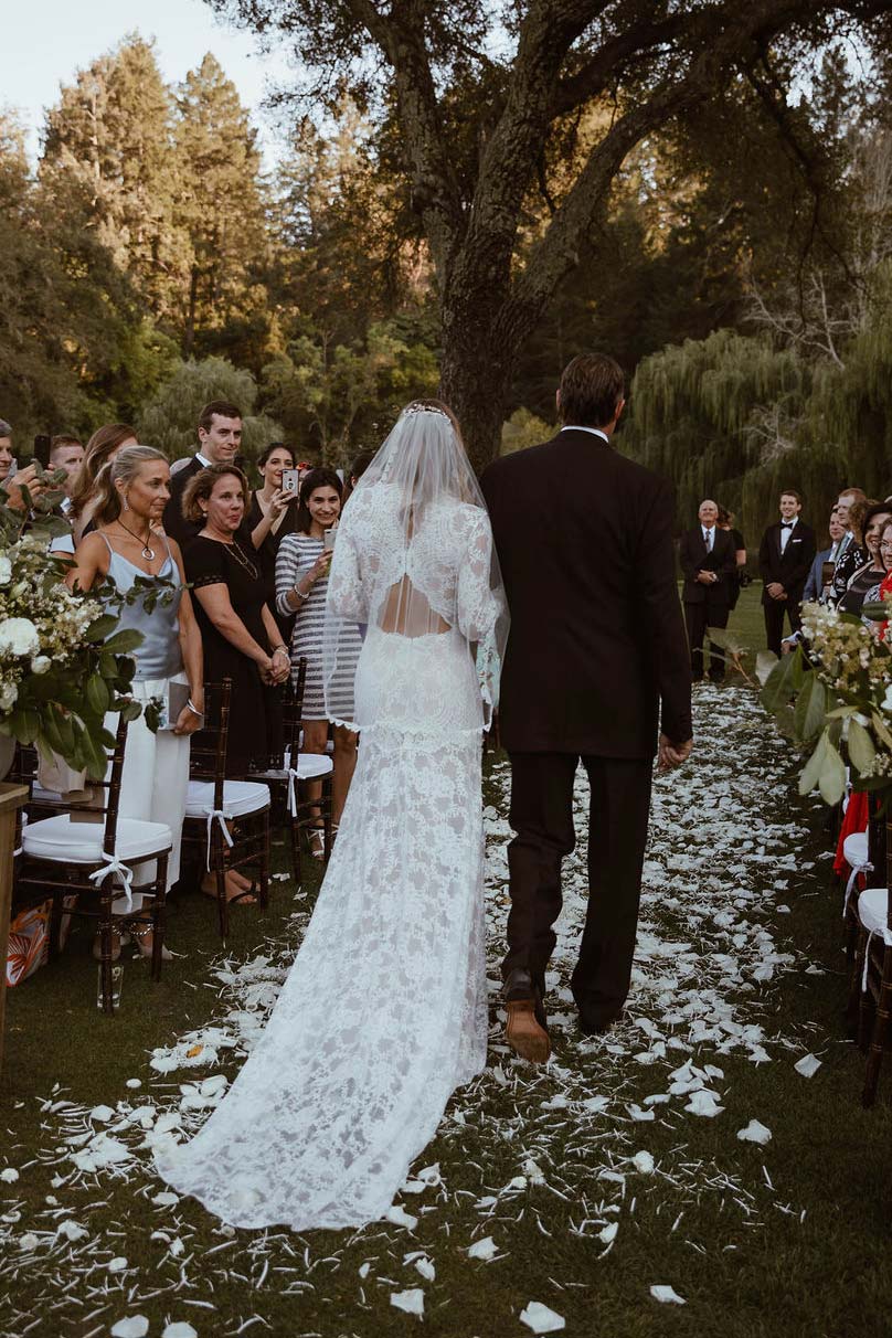 Bride Walking the Aisle with Father Bride in Lace Wedding Dress by Claire Pettibone