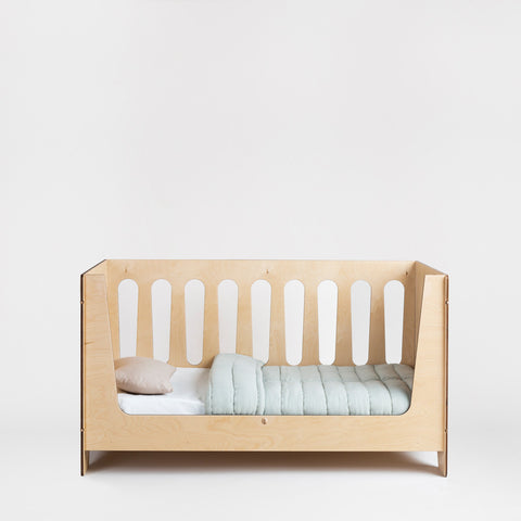The Ava Lifestages Cot is designed by PAOLO COGLIATI for Totem Italia