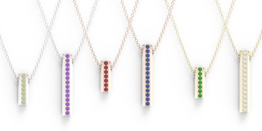 A variety of birthstone heart pendant necklaces
