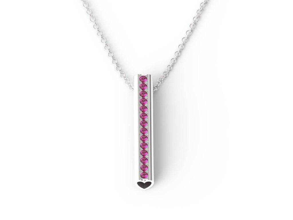 A Heart pendant necklace set with pink tourmaline stones