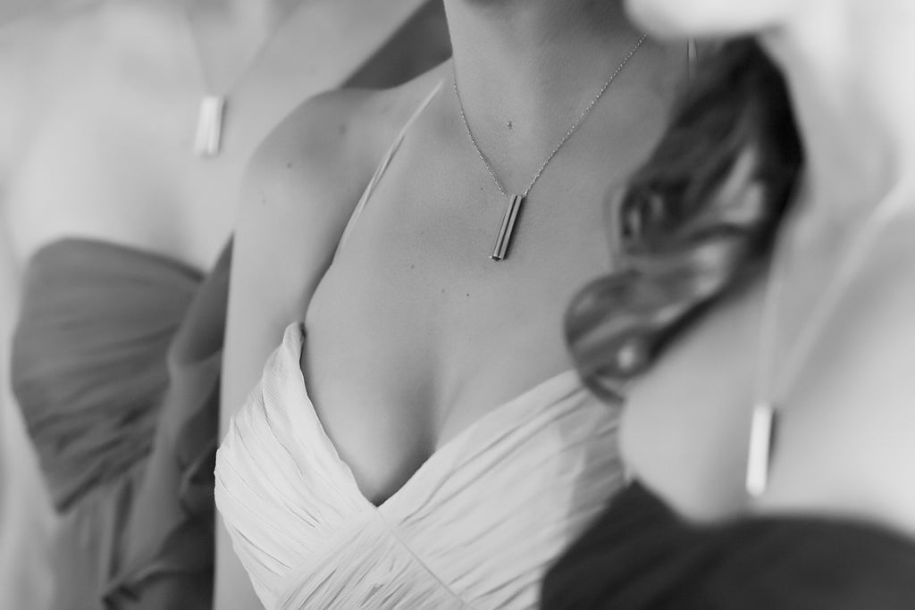Bride and bridesmaids wearing sterling silver necklaces