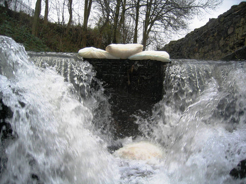 FloodSax stops water in its track.  Flood barrier 