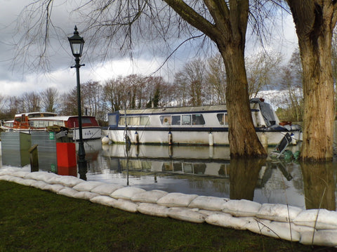 Floodsax instant sandless sandbag alternatives save caravan park in Windsor flood defence product flood defense product sandbags for flooding