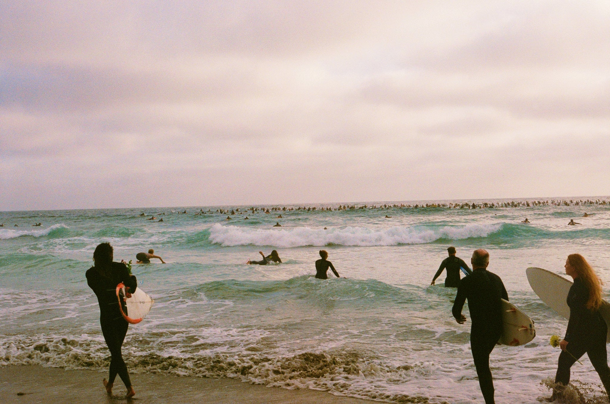 paddle for peace and paddle for unity paddle out in San Diego, California shot on 35mm film