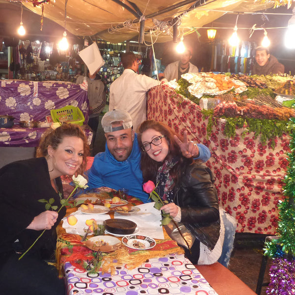 Eating Morrocan food in the main square in Marrakech