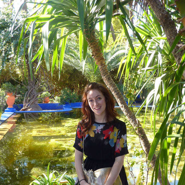 Sitting by the water in Marjorelle Gardens
