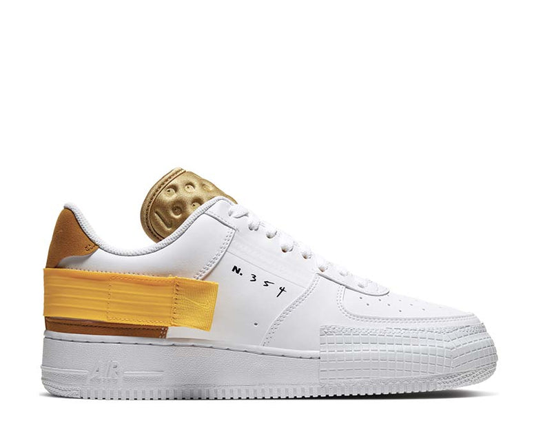 gold low top air force ones