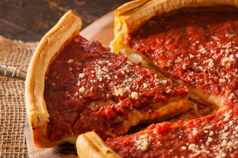 Chicago Style pizza enjoyed in a restaurant