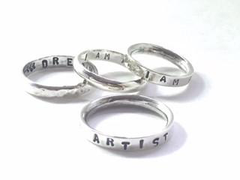 Handmade silver empowering word rings