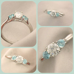 White gold engagement ring with blue zircon accent gems