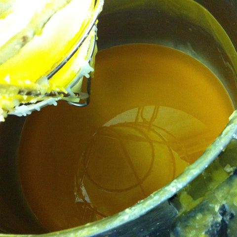 Melted filtered beeswax for candles. 