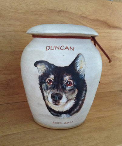 Pet urns by Malloryville Pottery 