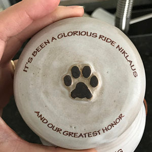 Pet loss quote on urn lid