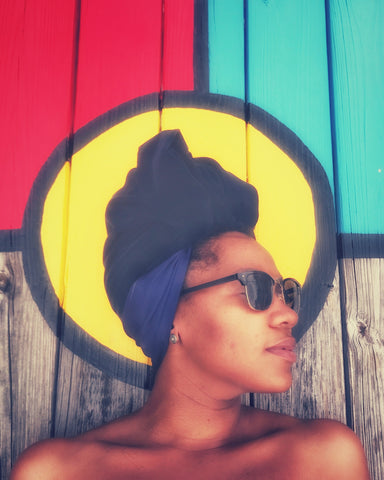woman in blue head wrap