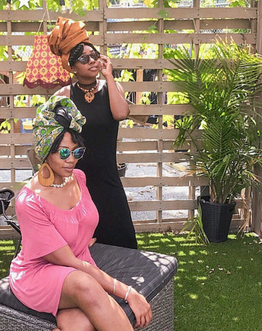 women in african print headwraps