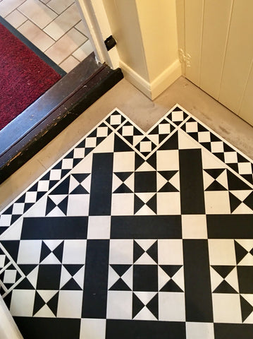 black and white tiles in corner