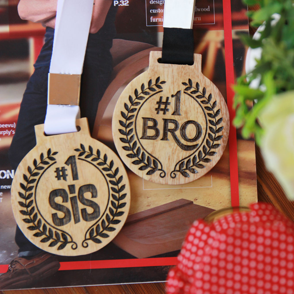 #1 Bro Wooden Medal. #1 Sis Wooden Medal. These Custom Medals Can Make The Best Gifts For Siblings. These Medals Can Be Presented As Awards For The Best Brother Or The Best Sister.