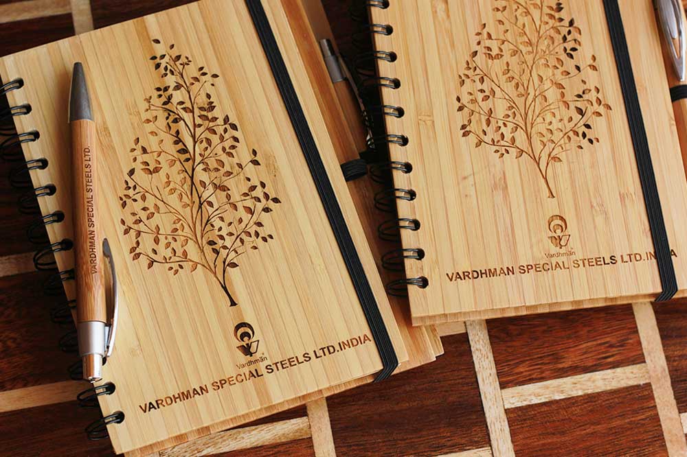 Custom Wooden Notebooks As Personalized Corporate Gifts For Vardhman Special Steels Ltd. India. Best Corporate Gifts for Employees and Promotional gifts for clients.